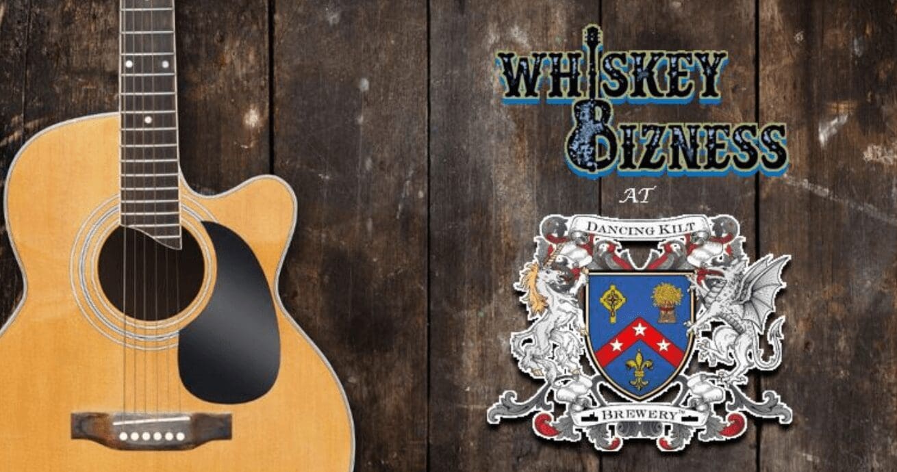 An acoustic guitar with the words whiskey business on it.